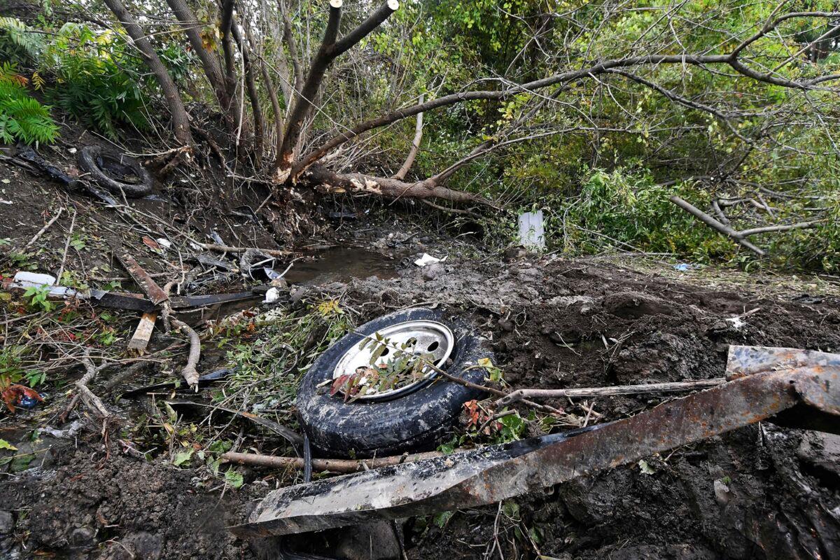 Debris scatters at the site of a fatal limousine crash that killed 20 people, in Schoharie, N.Y., on Oct. 7, 2018. (Hans Pennink/AP Photo)