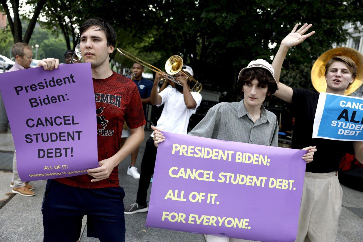 Activists rally outside the White House in Washington to call on President Joe Biden to cancel student loan debt on July 27, 2022. (Anna Moneymaker/Getty Images)