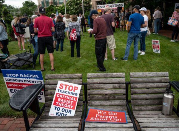 Demonstrators rally against critical race theory being taught in Loudoun County schools at the Loudoun County Government center in Leesburg, Virginia on June 12, 2021.  (Andrew Caballero-Reynolds/AFP via Getty Images)