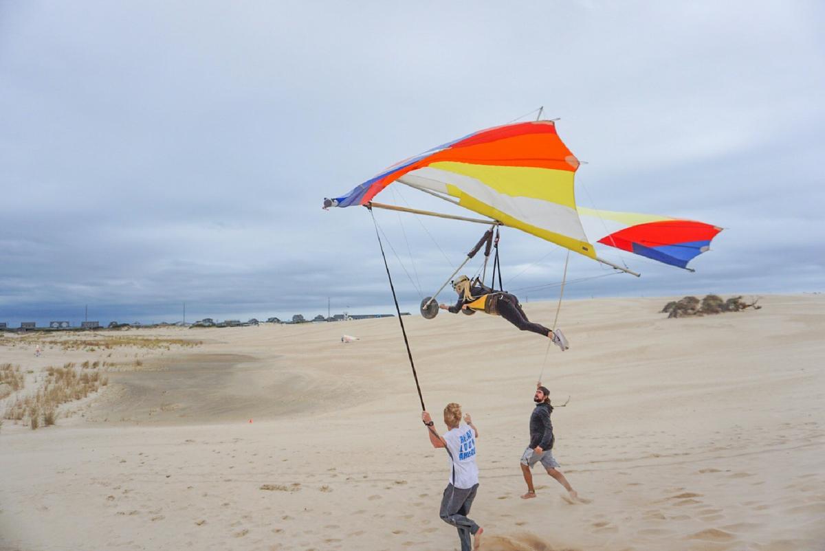 A couple learns to hang-glide in the Outer Banks of North Carolina. (Courtesy of Adventurepro)