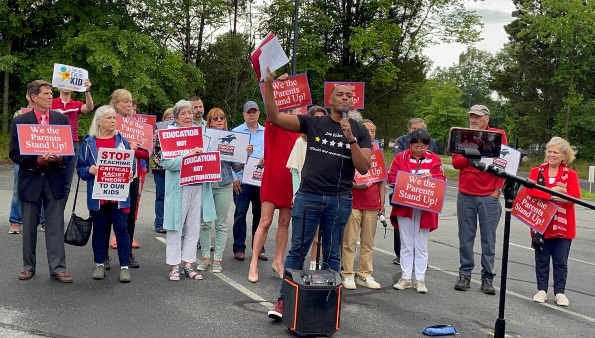 Parents speak out at a rally outside the Loudoun County Public School administration building on June 22, 2022. (Terri Wu/The Epoch Times)