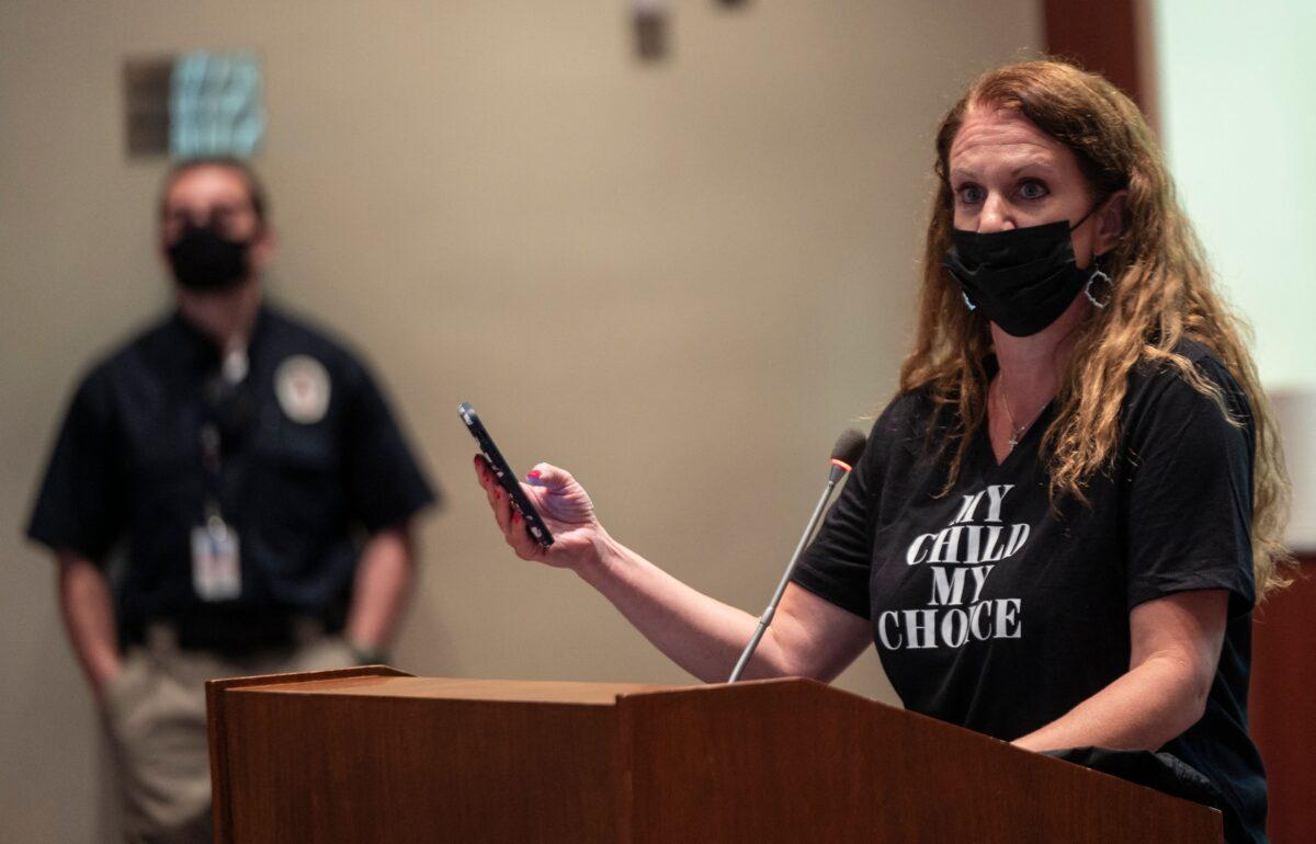 An increasing number of parents have raised concerns over radical ideological teaching in schools, as did Patti Hidalgo Menders during a Loudoun County Public Schools (LCPS) board meeting in Ashburn, Va., on Oct. 12, 2021. (Andrew Caballero-Reynolds/AFP)