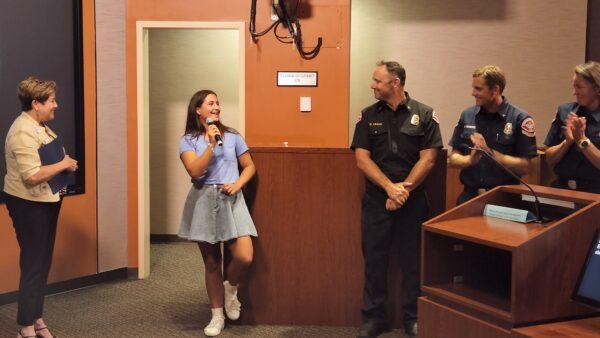 Elizabeth Felten was honored for saving a 6-year-old boy from drowning in May at the Huntington Beach City Council meeting in Huntington Beach on Aug. 2, 2022. (Courtesy of the City of Huntington Beach)