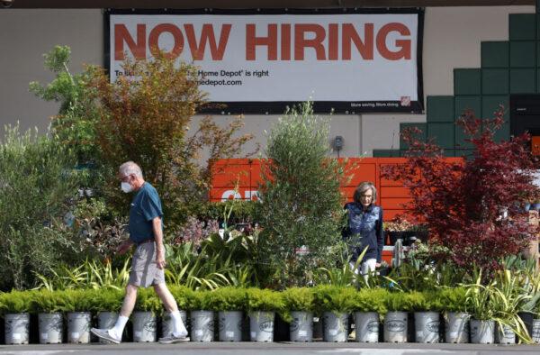 A sign proclaims "Now Hiring" at a Home Depot store in San Rafael, Calif., on Aug. 5, 2022. (Justin Sullivan/Getty Images)