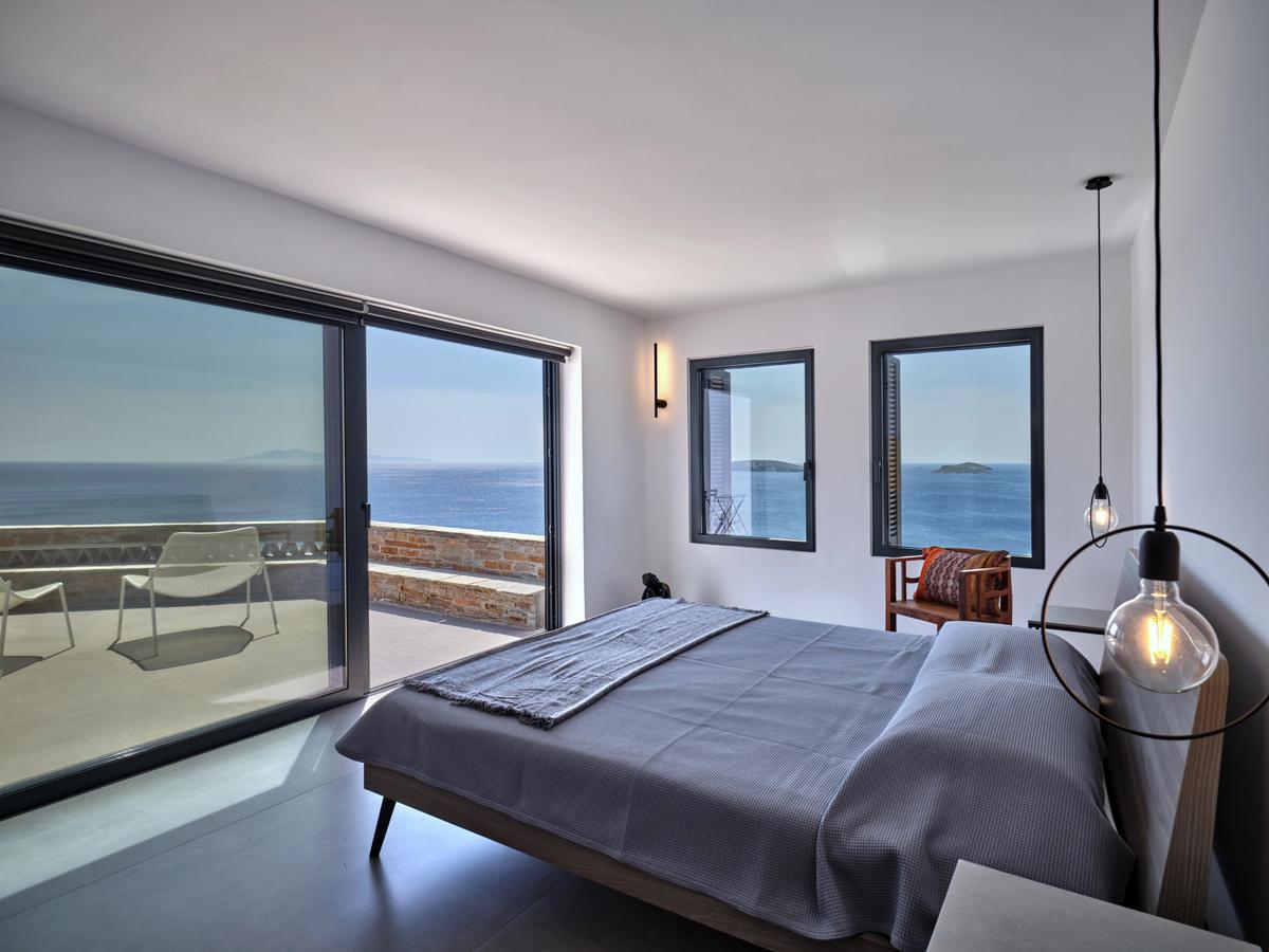 The villa’s bedrooms focus on functionality and taking full advantage of the marque feature of the property, the extraordinary surroundings. (Courtesy of Greece Sotheby's International Realty)