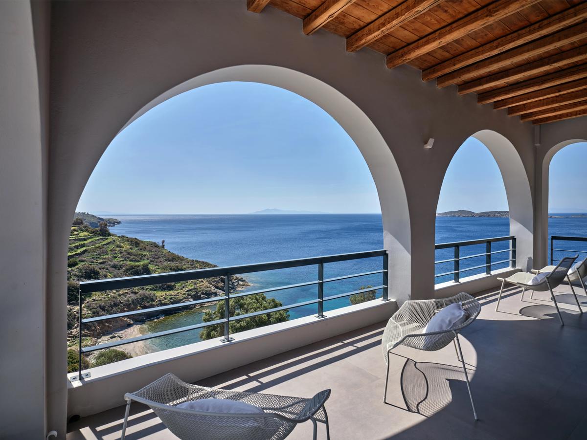 The villa enjoys an idyllic setting overlooking the sea. (Courtesy of Greece Sotheby's International Realty)