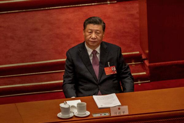 Chinese President Xi Jinping is seen during the Second Plenary Session of the Fifth Session of the 13th National People's Congress at the Great Hall of the People in Beijing, China, on March 8, 2022. (Andrea Verdelli/Getty Images)
