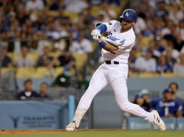 Joey Gallo #12 of the Los Angeles Dodgers singles during the eighth inning against the San Diego Padres at Dodger Stadium in Los Angeles, on August 05, 2022. (Harry How/Getty Images)