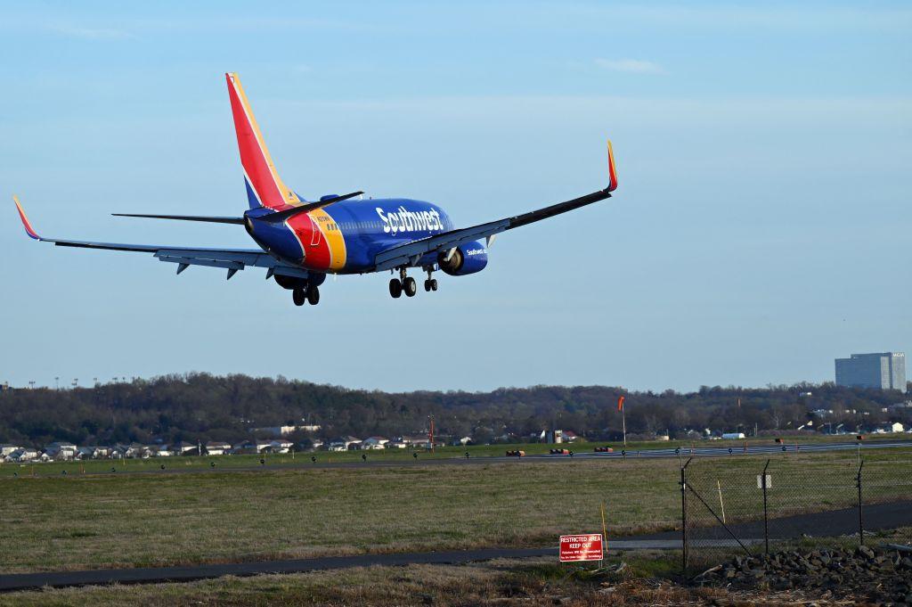 A Southwest Airlines plane approaches the runway at Ronald Reagan Washington National Airport (DCA) in Arlington, Va., on April 2, 2022. (Daniel Slim/AFP via Getty Images)