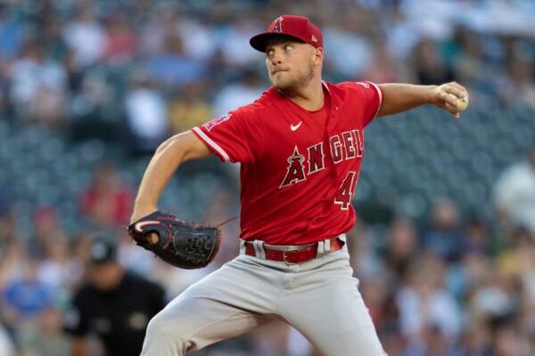 Los Angeles Angels starter Reid Detmers delivers a pitch during the first inning of the second game of a baseball doubleheader against the Seattle Mariners in Seattle, Saturday, Aug. 6, 2022. (Stephen Brashear/AP Photo)