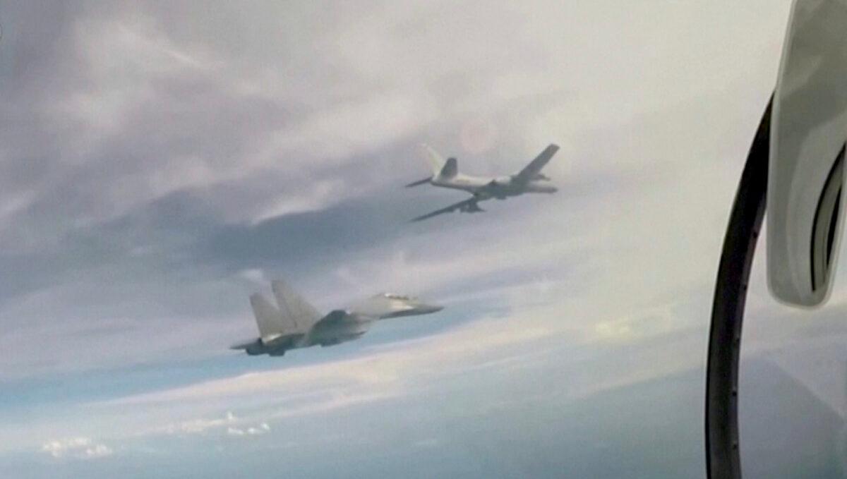 Chinese fighter jets fly near Taiwan in a still from a video released by Chinese state-run media CCTV on Aug. 7, 2022. (CCTV via Reuters/Screenshot via The Epoch Times)