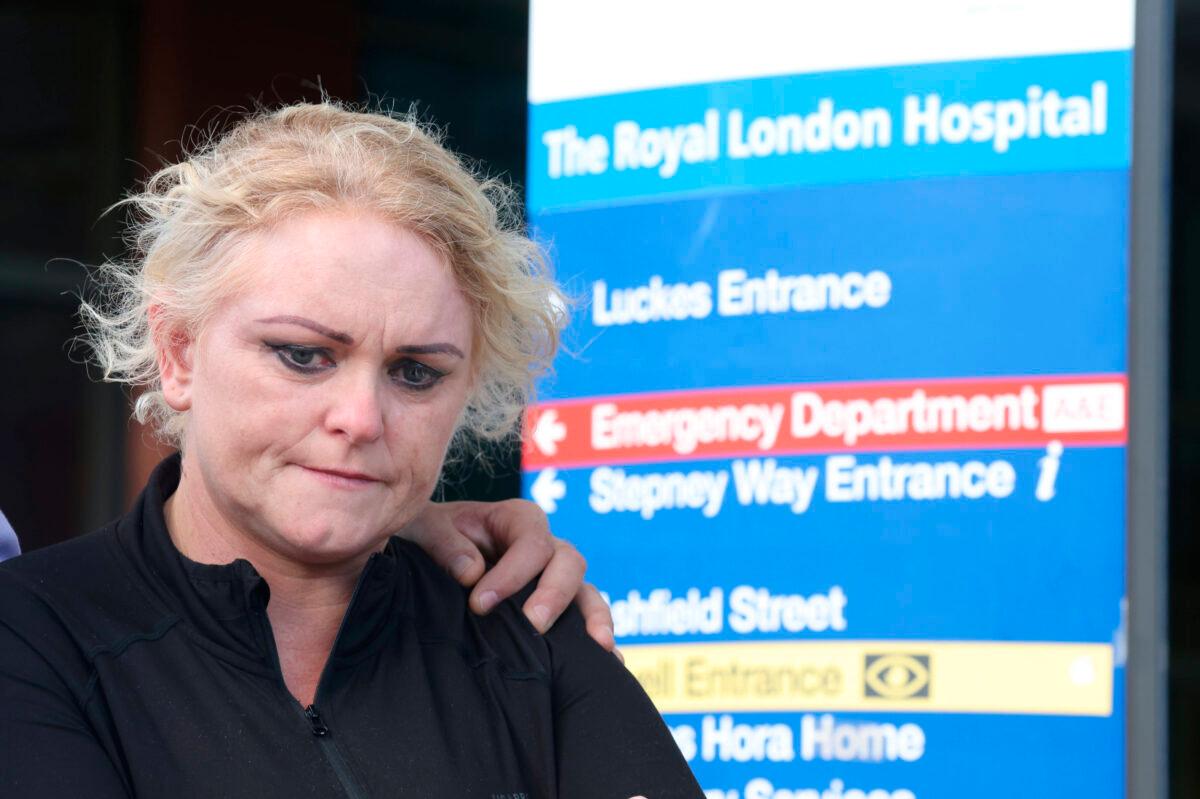 Hollie Dance, mother of 12-year-old Archie Battersbee, speaks to the media outside the Royal London hospital in Whitechapel, east London, on Aug. 3, 2022, after the European Court of Human Rights refused an application to postpone the withdrawal of his life support. (James Manning/PA via AP)