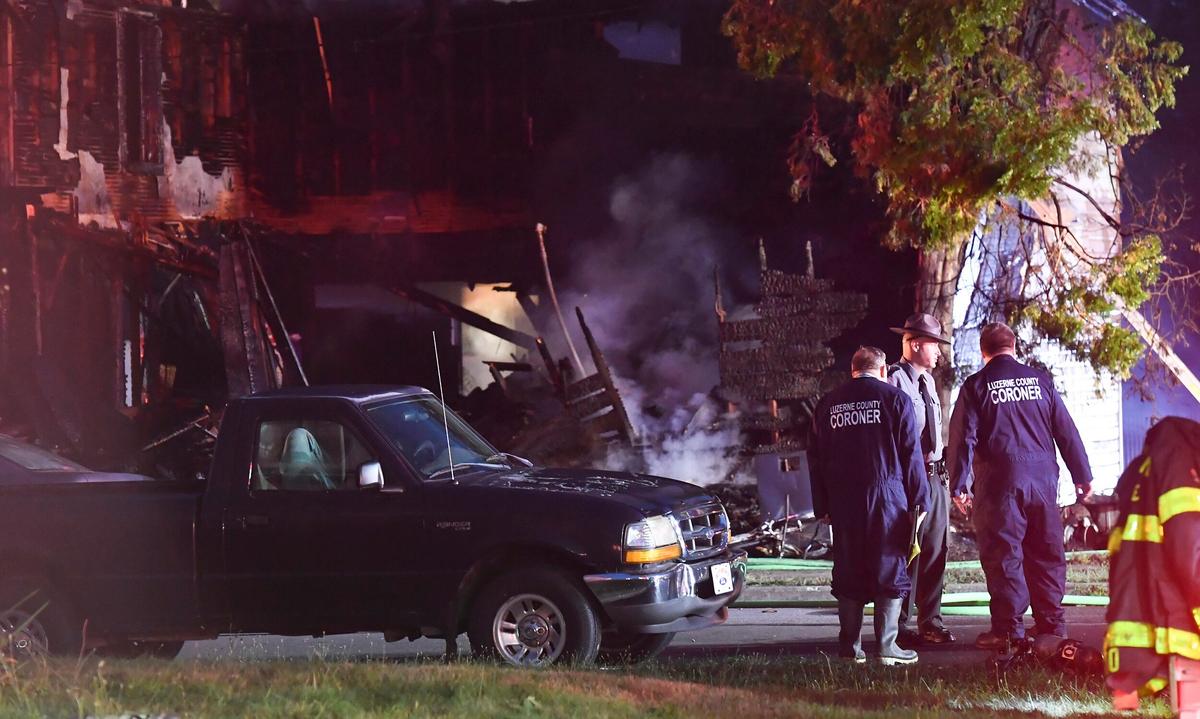 Coroner: Smoke Inhalation Killed at Least 5 of 10 in Fire