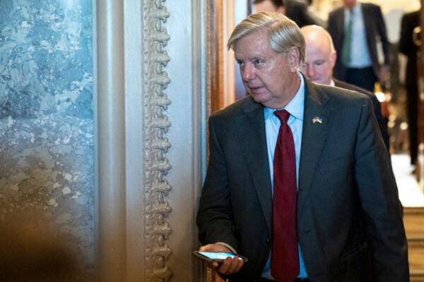Sen. Lindsey Graham (R-S.C.) leaves the Senate Chamber after final passage of the Inflation Reduction Act at the U.S. Capitol in Washington on Aug. 7, 2022. (Drew Angerer/Getty Images)