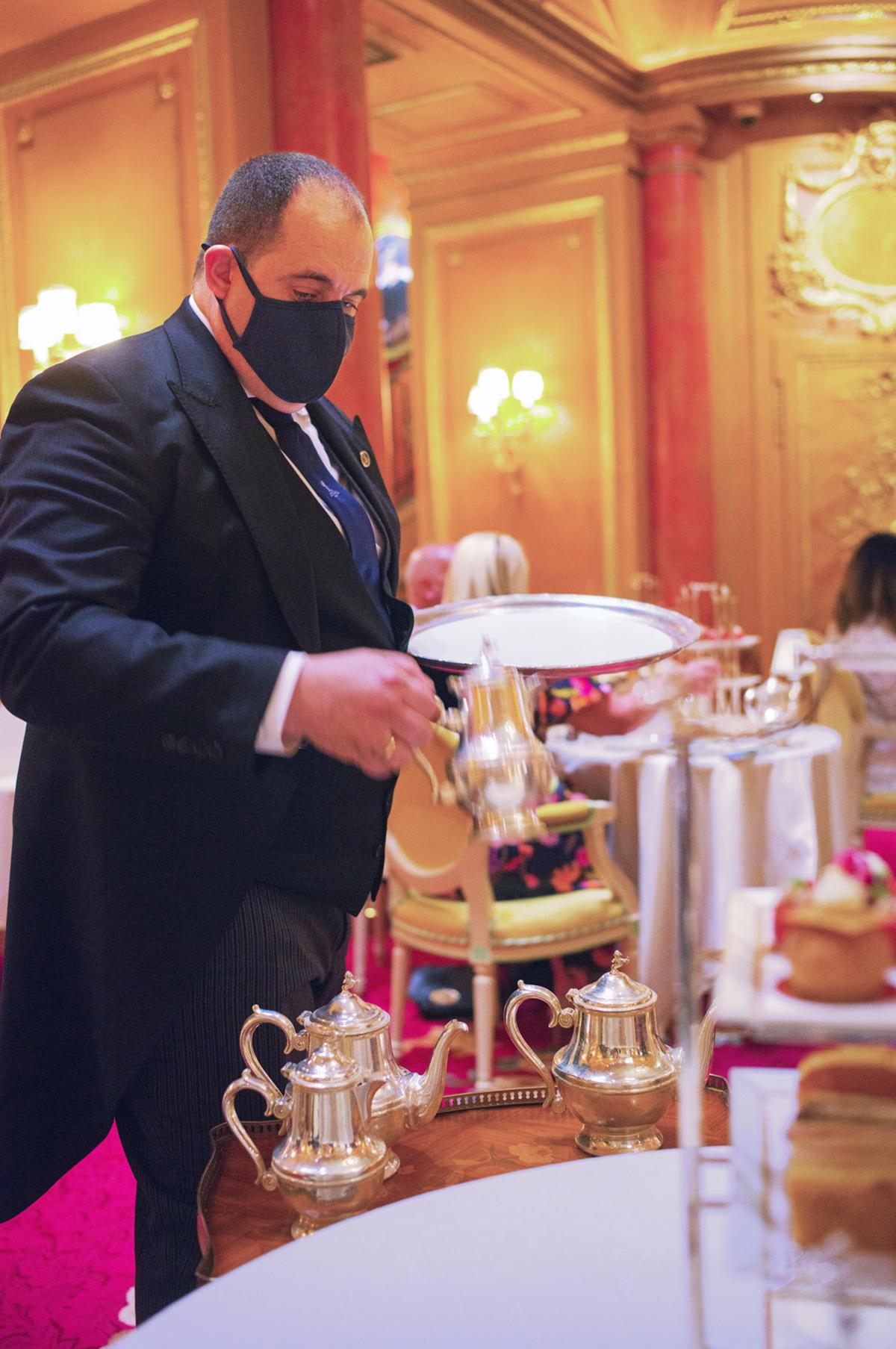 Giancomenic Scanu, deputy manager of The Palm Court, serving afternoon tea, The Ritz London. (Alan Behr/TNS)