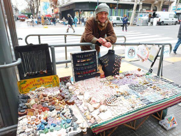 Juan Hernandez is a Buenos Aires, Argentina, local who sells jewelry part-time and buys U.S. dollars every chance he gets on Aug. 4, 2022. (Autumn Spredemann/The Epoch Times)
