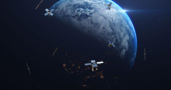 Animated illustration of satellites orbiting Earth. (By Yucel Yilmaz/Adobe Stock)