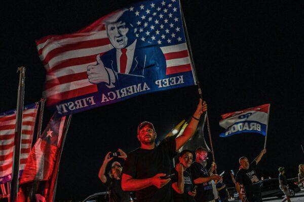 Supporters of former President Donald Trump stand outside his residence in Mar-A-Lago, Palm Beach, Florida on Aug. 8, 2022. (Giorgio Viera/AFP via Getty Images)