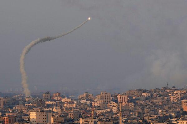 Rockets are launched from Gaza towards Israel, over Gaza City, on Aug. 7, 2022. (Adel Hana/AP Photo)