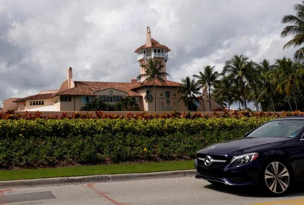 A car passes in front of former President Donald Trump's Mar-a-Lago resort in Palm Beach, Fla., on Feb. 11, 2022. (Joe Raedle/Getty Images)
