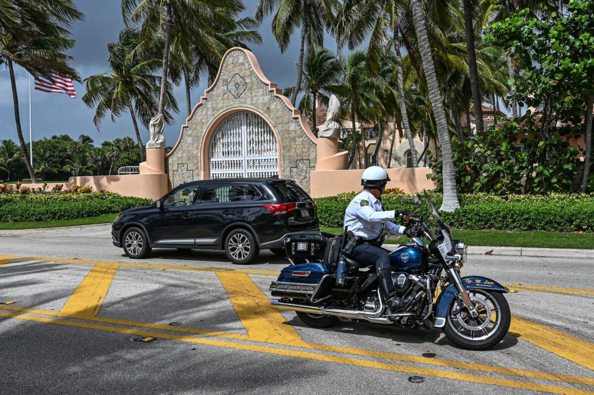 Local law enforcement officers in front of the home of former U.S. President Donald Trump at Mar-A-Lago in Palm Beach, Fla., on Aug. 9, 2022. (Giorgio Viera/AFP via Getty Images)