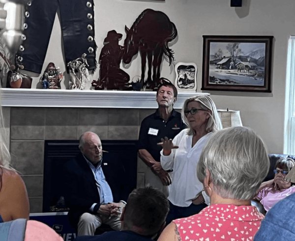 Rep. Liz Cheney (R-Wyo.) speaks with supporters, including her father, former Vice President Dick Cheney, during a private gathering in a Cheyenne home on Aug. 7. (Courtesy of Cheney For Wyoming)