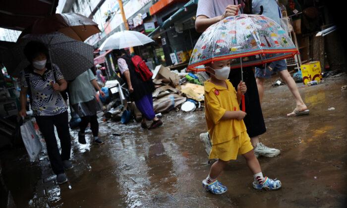 Record Rain Leaves at Least 8 Dead in South Korean Capital