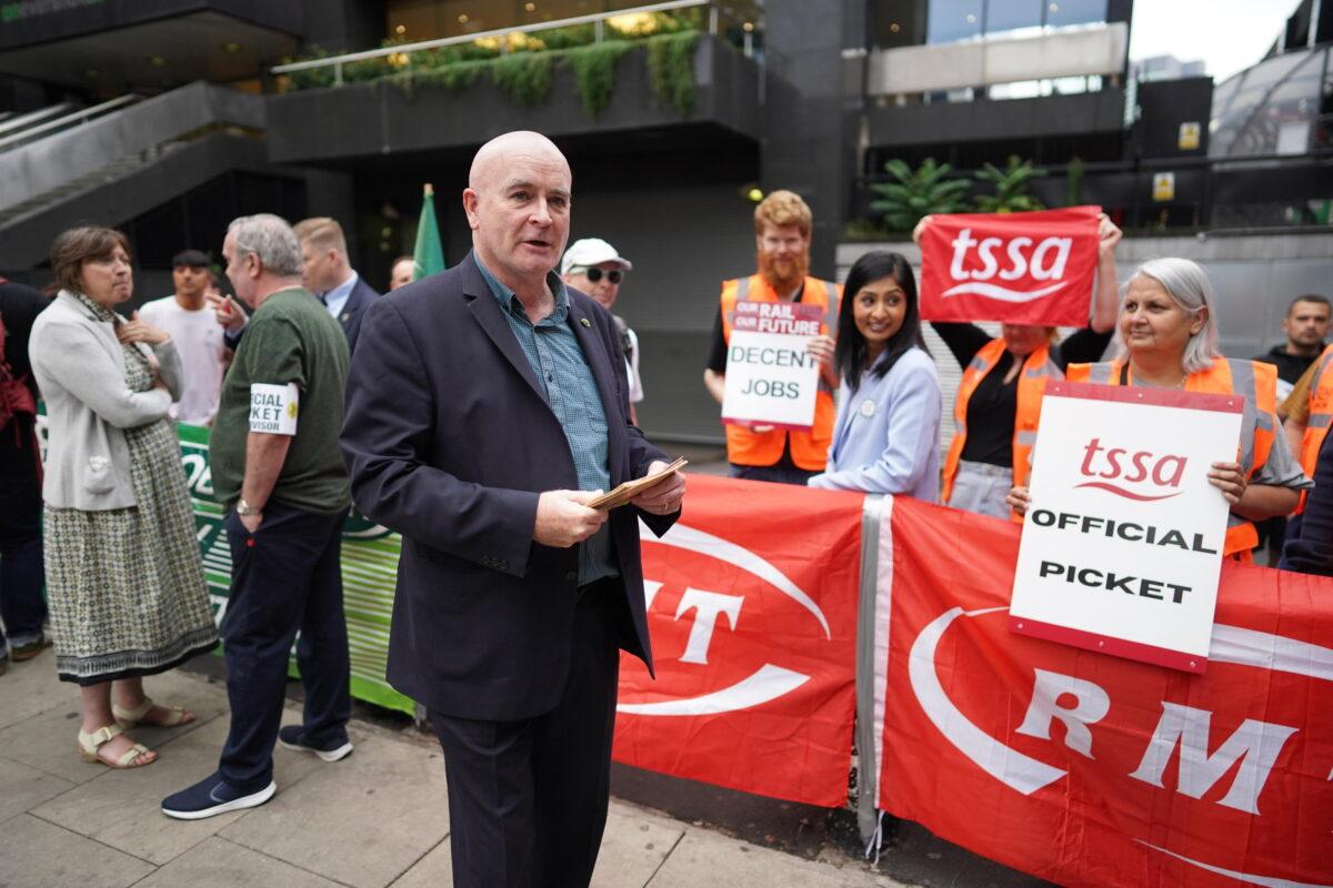 Mick Lynch, general secretary of the Rail, Maritime, and Transport union, on the picket line outside London Euston train station in an undated file photo. (Stefan Rousseau/PA)