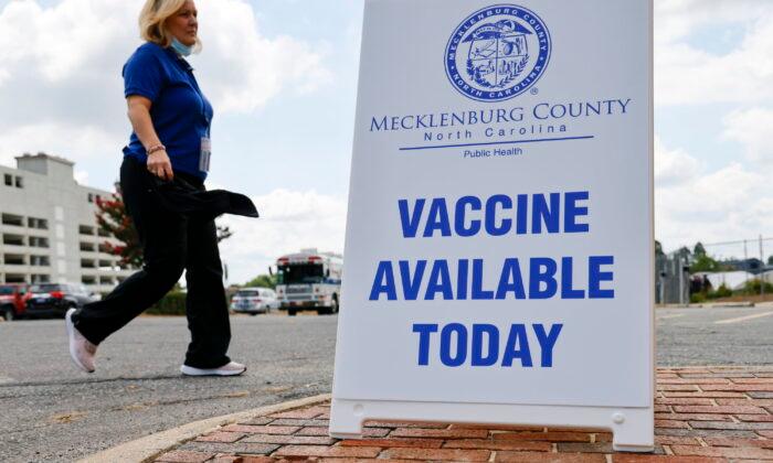 A Mecklenburg County Public Health employee arrives at a monkeypox vaccine clinic in Charlotte, N.C., on Aug. 20, 2022. (Nell Redmond/AP Photo)
