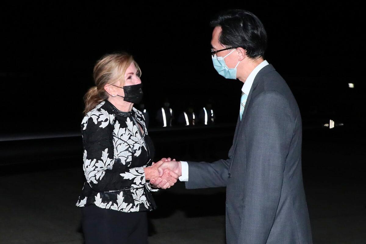 Senator Marsha Blackburn (R-Tenn.) is greeted by Douglas Yu-Tien Hsu, Director-General, Taiwan's dept. of North American Affairs, as she arrives on a plane in Taipei, Taiwan, on Aug. 25, 2022. (Taiwan Ministry of Foreign Affairs via AP)