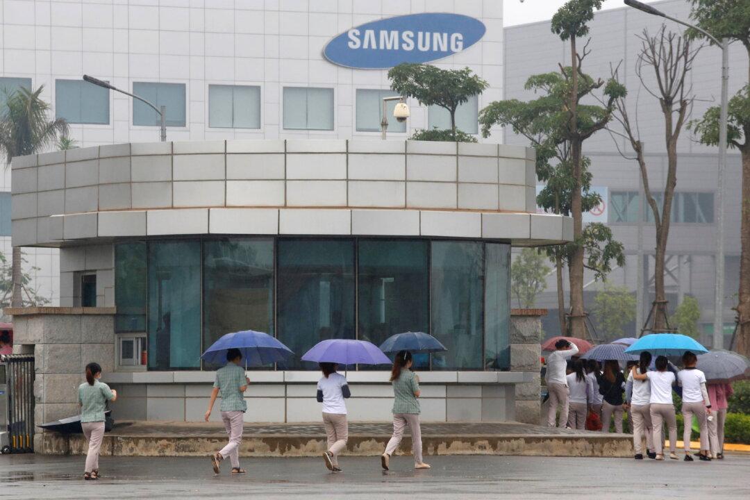 Samsung Workers in Vietnam Bear Brunt of Slowdown in Global Demand for Electronics