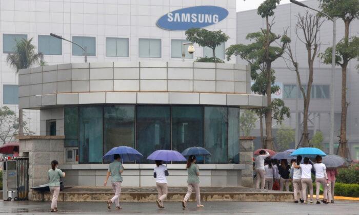 Samsung Workers in Vietnam Bear Brunt of Slowdown in Global Demand for Electronics
