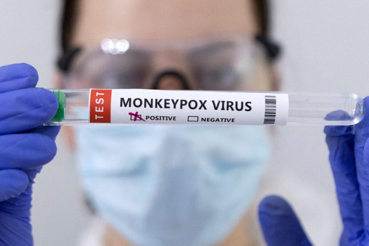 Test tubes labeled "Monkeypox virus positive" are seen in this illustration taken on May 23, 2022. (Dado Ruvic/Illustration/Reuters)