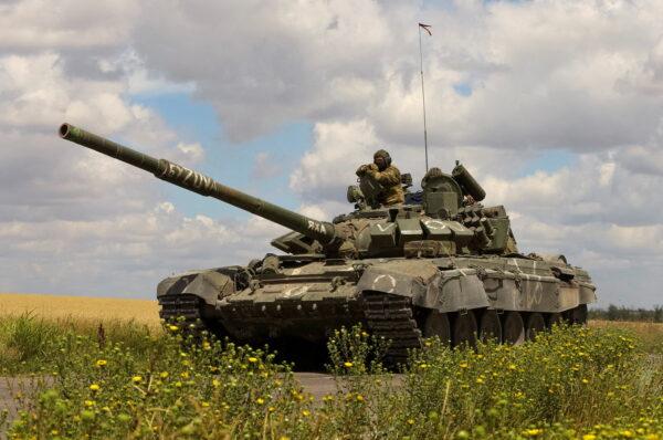 A Russian tank drives through a Russian-held part of Zaporizhzhia region in southern Ukraine on July 23, 2022. (Alexander Ermochenko/Reuters)