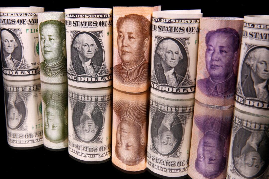 State-Owned Banks Dump Stocks of Dollars to Rescue Yuan as Chinese Economy Deteriorates