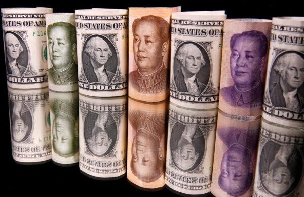 Chinese yuan and U.S. dollar banknotes. (Reuters/Dado Ruvic/File photo)