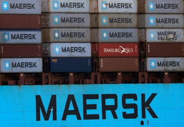 Shipping containers are transported on a Maersk Line vessel through the Suez Canal in Ismailia, Egypt, on July 7, 2021. (Amr Abdallah Dalsh/Reuters)