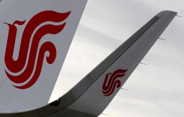The logo of Air China is pictured on a tail of an airplane parked at the aircraft builder's headquarters of Airbus in Colomiers near Toulouse, France, on Nov. 15, 2019. (Regis Duvignau/Reuters)