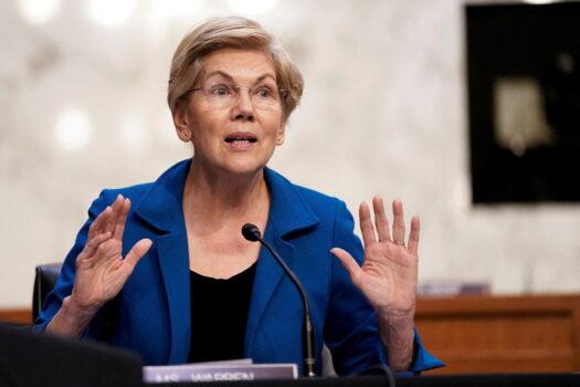 Sen. Elizabeth Warren (D-Mass.) gestures as Federal Reserve Chair Jerome Powell testifies before a Senate Banking, Housing, and Urban Affairs Committee hearing on the "Semiannual Monetary Policy Report to the Congress" on Capitol Hill in Washington on June 22, 2022. (Elizabeth Frantz/Reuters)