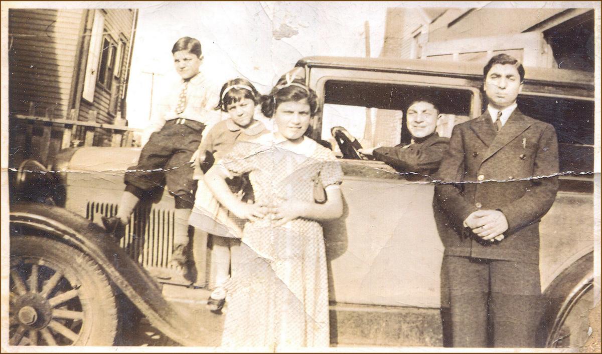 A teenaged Critelli sits in the driver’s seat behind his family (L–R) brother Johnny, sister Rose, sister Anna, and cousin Joe Montuoro, circa 1939. (Courtesy of Dominick Critelli)