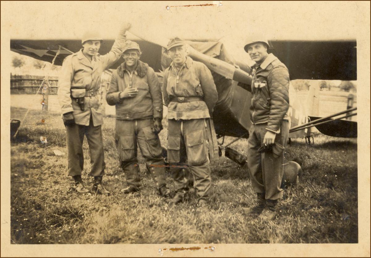 Critelli (R), with an Army buddy (L) and two German POWs, in Warendorf, Germany, on May 18, 1945. (Courtesy of Dominick Critelli)