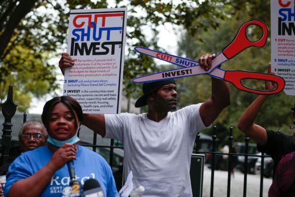 Demonstrators call for the closing of the Rikers Island prison as they protest outside City Hall in New York, on Sept. 22, 2021. (Photo by Kena Betancur/AFP via Getty Images)
