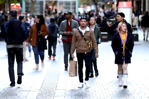 Shoppers walk around Pitt Street Mall in Sydney, Australia, on June 7, 2022. (Brendon Thorne/Getty Images)