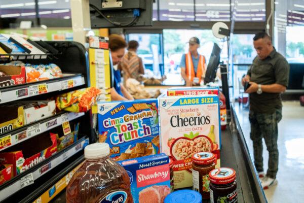 A cashier processes a customer's order in a Kroger grocery store in Houston, Texas, on July 15, 2022. (Brandon Bell/Getty Images)