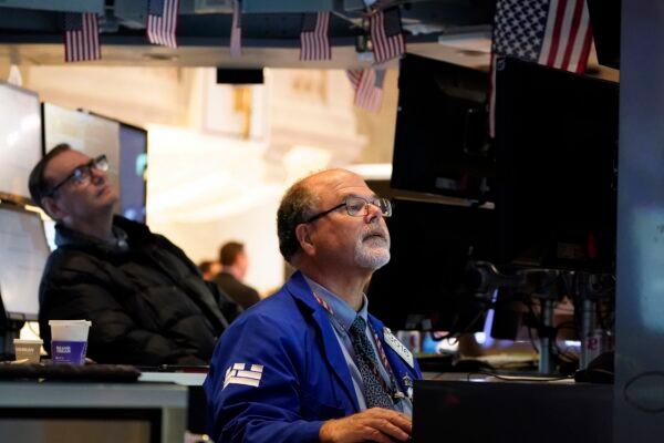 Traders work on the floor at the New York Stock Exchange in New York on Aug. 10, 2022. (Seth Wenig/AP Photo)