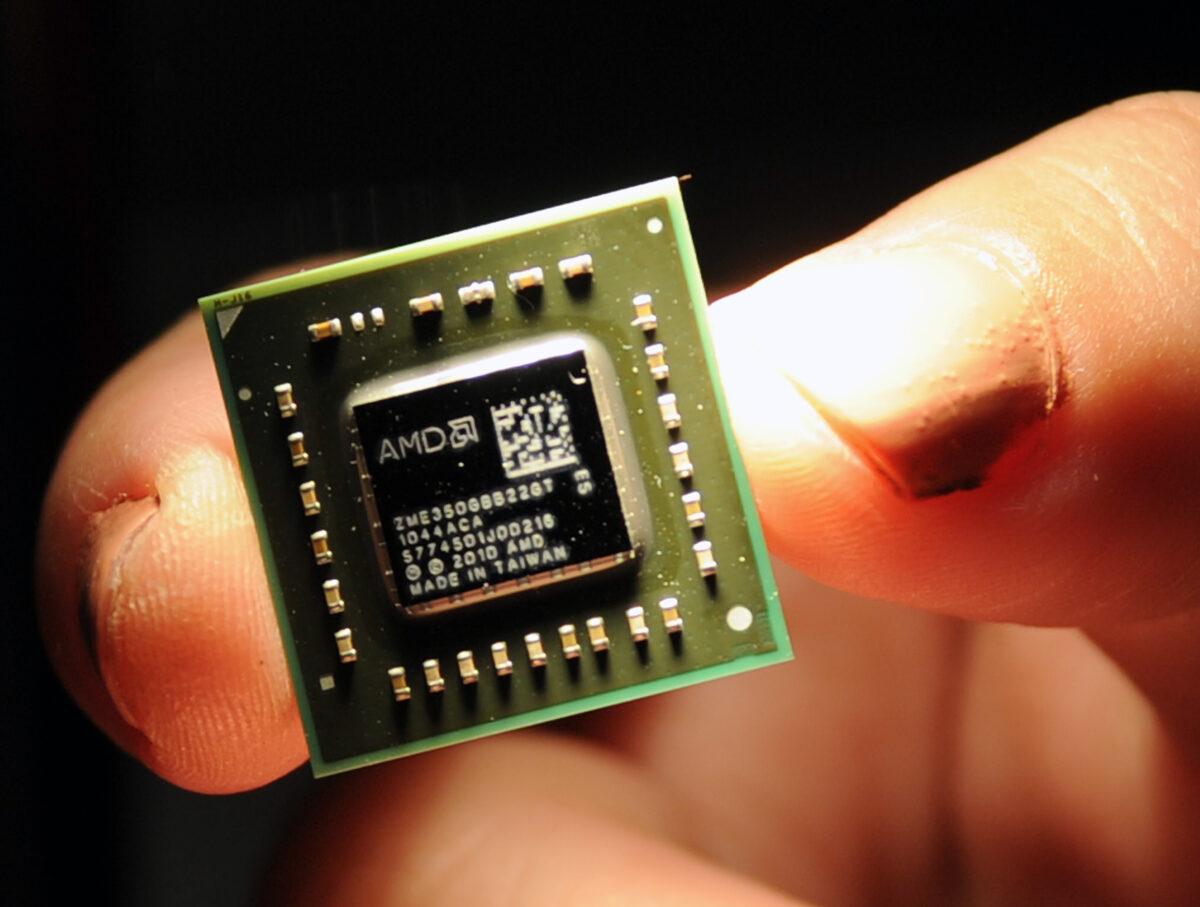 A chip used in central processing units and graphic processing units developed by AMD is displayed during a press conference held in Taipei, Taiwan, on May 24, 2011. (Sam Yeh/AFP via Getty Images)