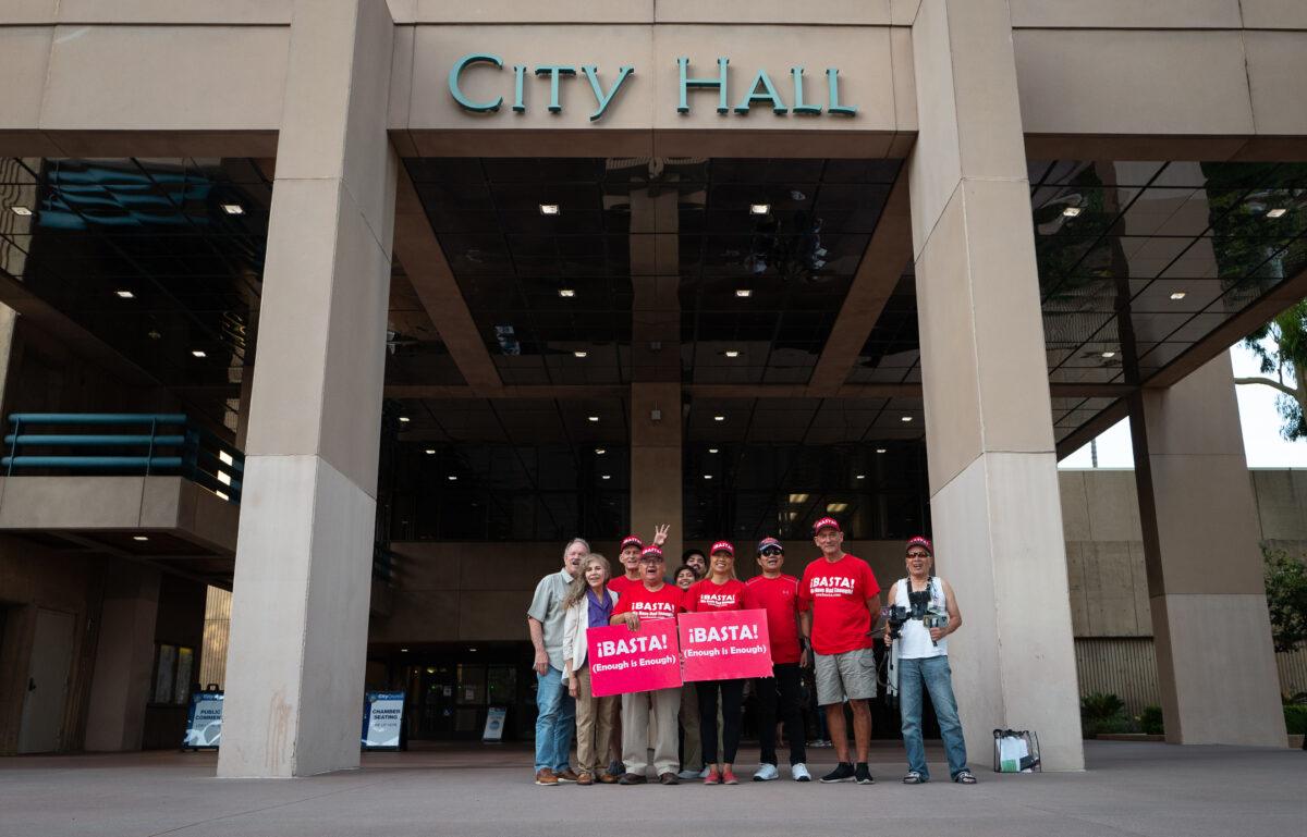 Basta members stand in front of Anaheim city hall on Aug. 9, 2022. (John Fredricks/The Epoch Times)