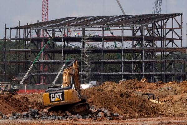 Construction personnel work on the Carolina Panthers' practice facility in Rock Hill, S.C., Aug. 24, 2021. (Chris Carlson, File/AP Photo)