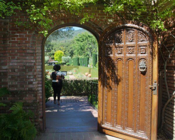 Entrance to the sunken garden. The Bourns transferred the oak door from their townhouse in San Francisco. (Courtesy of Karen Gough)