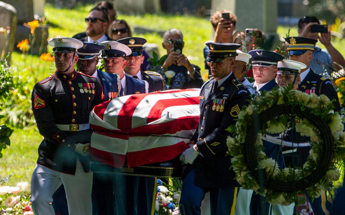Pallbearers carry the coffin of late Congresswoman Jackie Walorski during her burial service at Southlawn Cemetery in South Bend, Ind., on Aug. 11, 2022. (Chloe Trofatter/South Bend Tribune via AP)